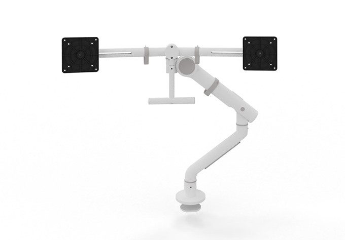 A sleek, white dual monitor arm with a desk-mounted design for ergonomic work at office desks.