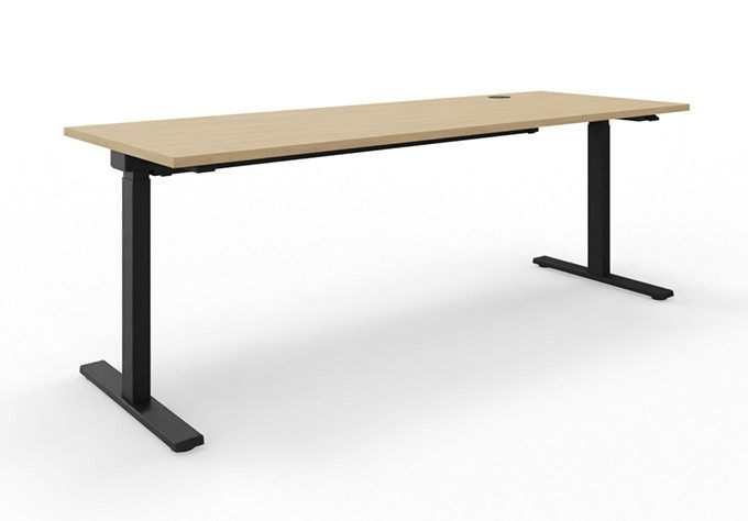 Electrically height-adjustable desk with a black frame and an oak-effect tabletop for ergonomic working.